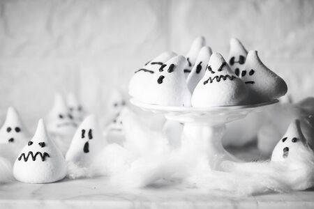 ghost-shaped meringues: sweets for halloweenの写真素材