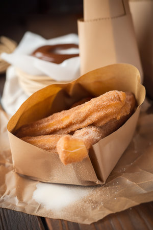 Churros in a paper bag, AI generative Spanish street foodの素材