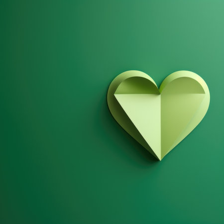 A paper heart on a green background. Green Tuesday background.の素材