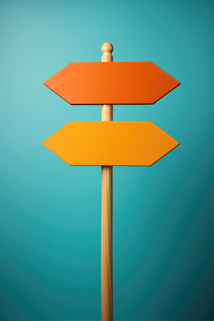 Two blank wooden signs pointing in different directions.の素材