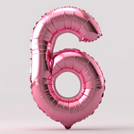 A pink balloon shaped like the number six.の素材