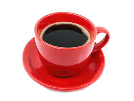 A red cup of coffee on a saucer.の素材