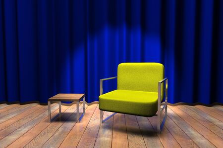 Blue curtain stage with a yellow sofa and small tableの写真素材