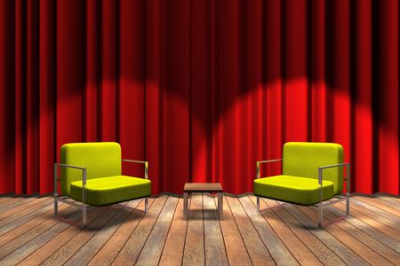 Red curtain stage with two yellow sofas and small tableの写真素材