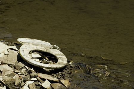Waste by the riverの写真素材