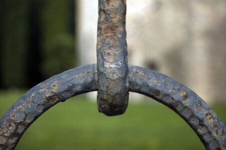 Close view of two metallic rings tightly connectedの写真素材