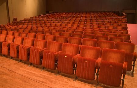 A hall with seats seen from the stageの写真素材