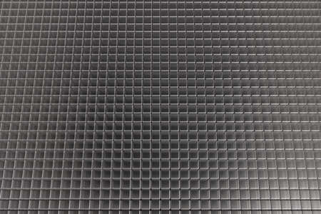 Abstract background made of a net of transparent gray cubesの写真素材