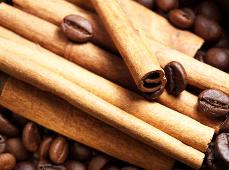 Coffee beans and cinnamon backgroundの写真素材