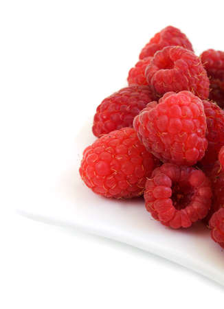 Plate of  Raspberries on a white background