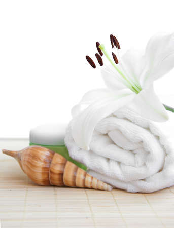 spa feeling  flower, towel, cream and seashell の写真素材