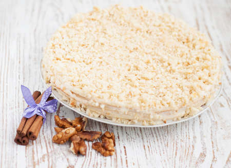 Homemade  sour cream cake, cinnamon and walnutsの写真素材
