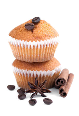 Muffins with cinnamon, coffee beans and aniseの写真素材