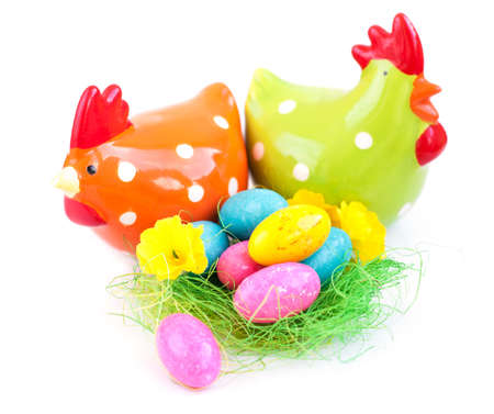 Colorful eggs in a traditional easter decoration nestの写真素材