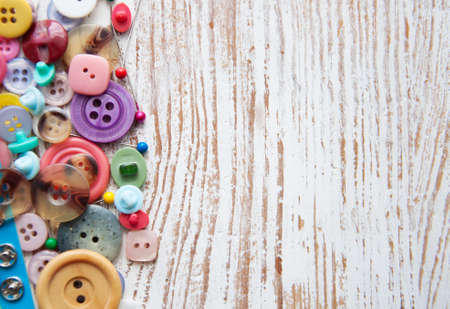 Sewing stuff on a old wood backgroundの写真素材