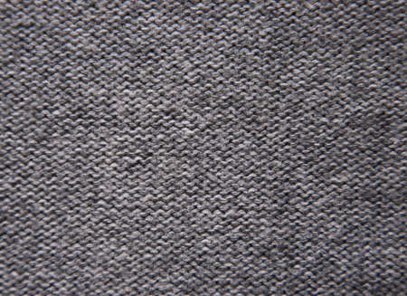 Gray knitting background of handmade woolen pattern