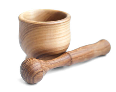 Wood Pestle and Mortar on a white backgroundの写真素材