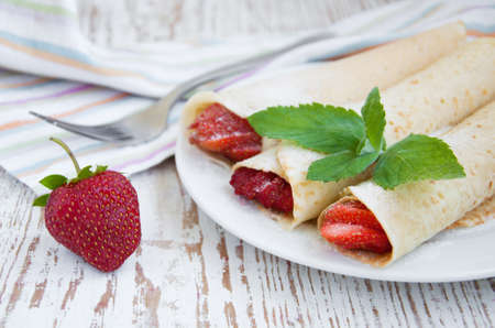 delicious  breakfast -  sweet pancakes with strawberryの写真素材