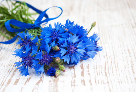 Cornflower bouquet  on a wooden  backgroundの写真素材