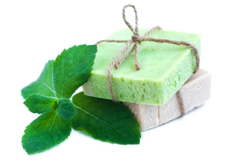 homemade soaps stack with fresh mint leavesの写真素材