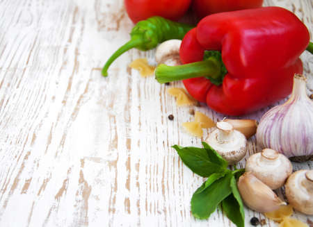 Fresh summer vegetables on a wooden  backgroundの写真素材