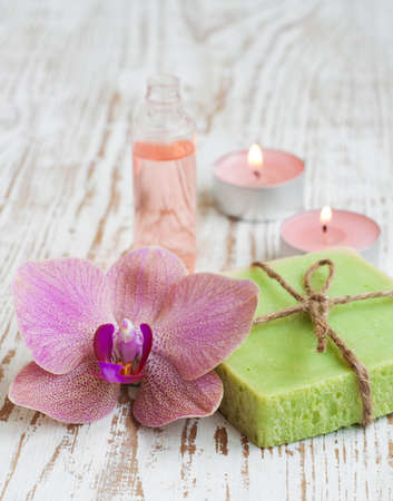 Aromatherapy bottle, orchids and handmade soap barsの写真素材