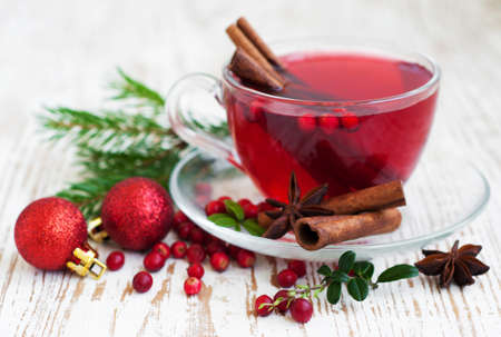 Hot winter drink with cranberries and cinnamonの写真素材