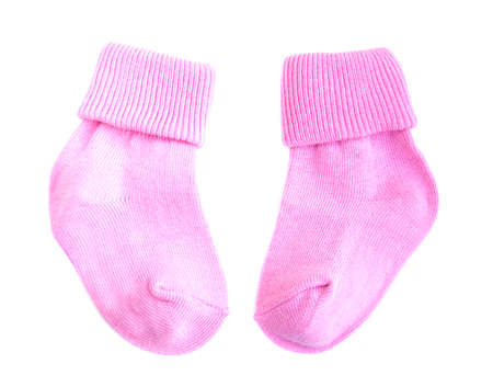 pink newborn baby socks on a white background