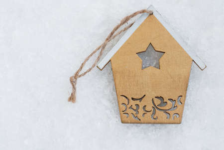 Christmas decoration - Christmas toy on a white snow backgroundの写真素材
