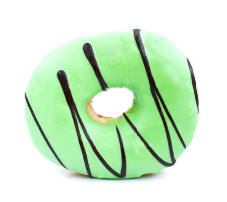 donut with green  icing a on a  white backgroundの写真素材