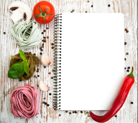 blank paper for recipes with ingredients - tomato, pasta, pepperの写真素材