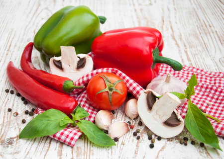 Vegetables composition with peppers, tomato, basilの写真素材