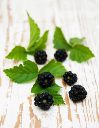 Ripe fresh organic blackberry on a wooden backgroundの写真素材