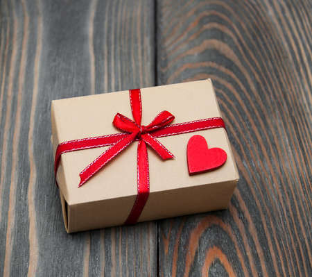 vintage gift box package  on old wooden backgroundの写真素材