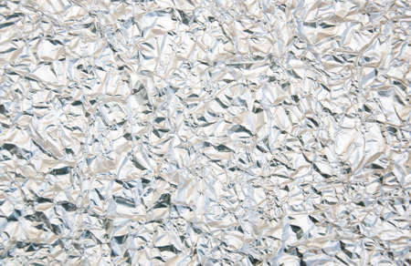 crumpled aluminium foil with textured surface