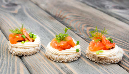 canape with salmon and dill for partyの写真素材