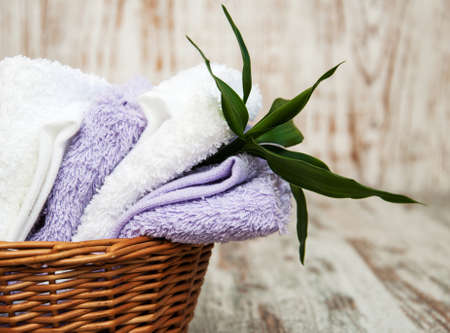soft and fresh towels in basket â beauty treatmentの写真素材