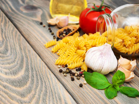 garlic, tomato and others ingrdients for italian pastaの写真素材