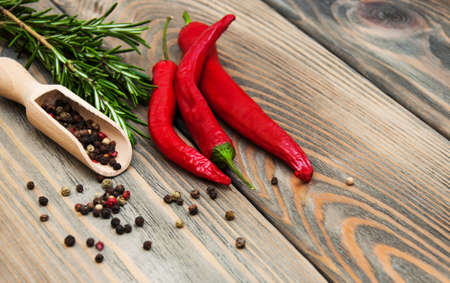 herbs and spices on a old wooden backgroundの写真素材