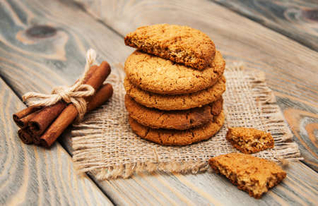 Oatmeal cookies on a old wooden 