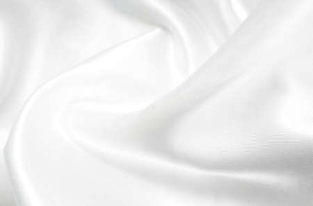 smooth elegant white silk can use as wedding backgroundの写真素材