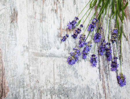 lavender flowers on a old wooden backgroundの写真素材