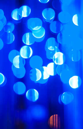 blue festive  abstract background with bokeh lightsの写真素材