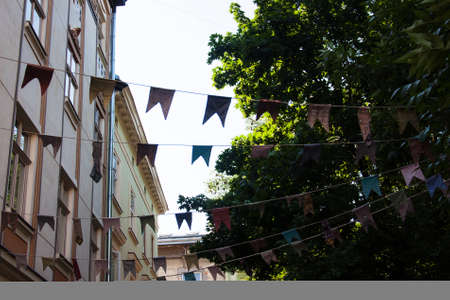Decorative vintage garland from  flags in Lviv, Ukraineの写真素材