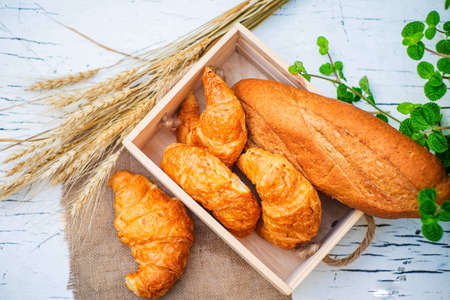fresh bread in wooden boxの写真素材