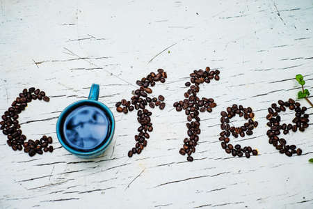 coffee word on old tableの写真素材