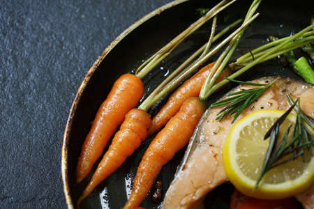 salmon steak in panの写真素材