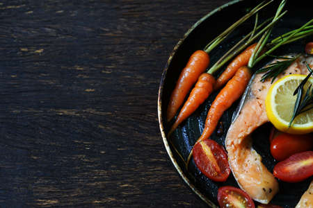 salmon steak in panの写真素材