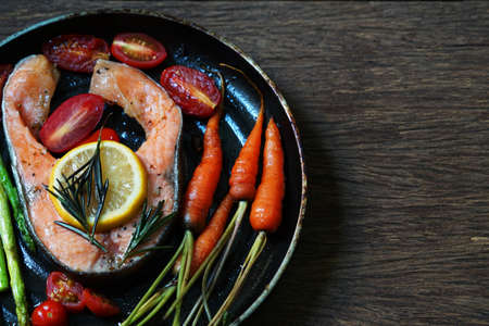 salmon steak in panの写真素材