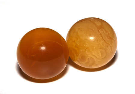 Amber spheres on a white table. Baltic seaの写真素材